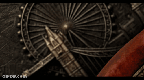 A Sign That Says Bloody On It With Roses Around It GIF