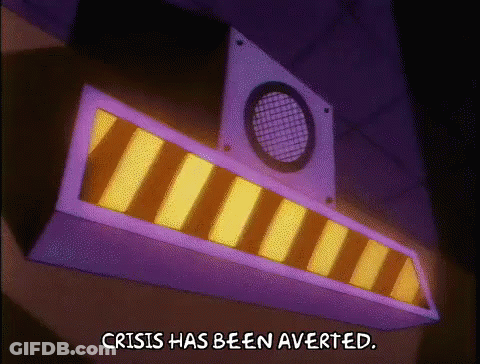 A Sign That Says Crisis Has Been Averted In A Cartoon GIF