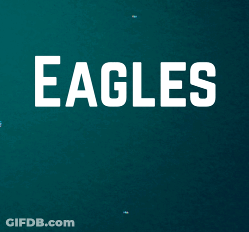 A Sign That Says Eagles Win On A Blue Background GIF