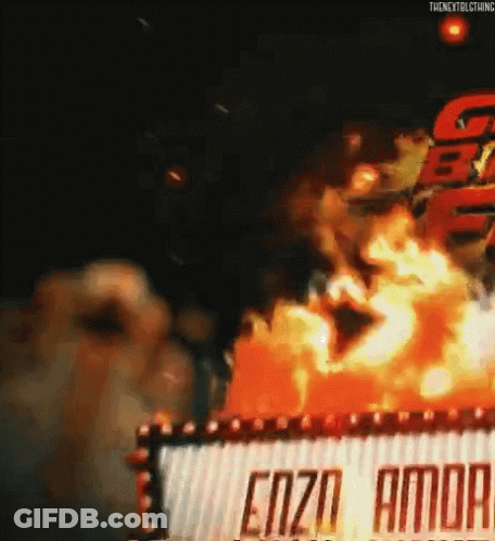 A Sign That Says ' Enzo Amor ' On It Is On Fire GIF