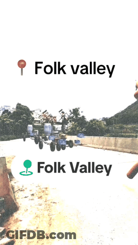 A Sign That Says Folk Valley On It In Black Letters GIF