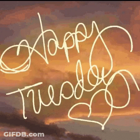 A Sign That Says " Happy Tuesday " With A Heart In The Middle GIF