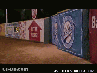 A Sign That Says Hit It Here Is On A Fence GIF