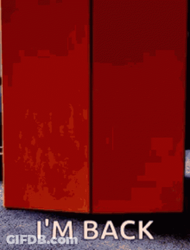 A Sign That Says I 'M Back Is Next To A Door GIF