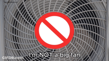 A Sign That Says I 'M Not A Big Fan Is Above A Fan GIF