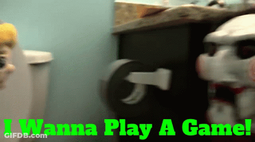 A Sign That Says " I Wanna Play A Game " On It GIF