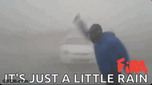 A Sign That Says It 'S Just A Little Rain With A Car In The Background GIF