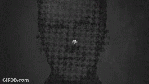A Sign That Says Just Between Us With Two People Behind It GIF