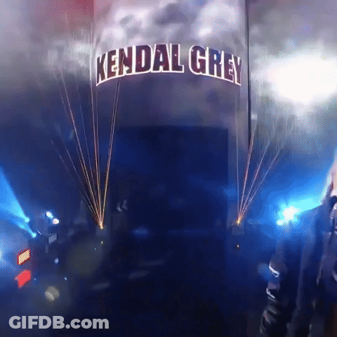 A Sign That Says Kendal Grey Is Lit Up With Blue Lights GIF