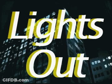 A Sign That Says Lights Out On A Dark Background GIF