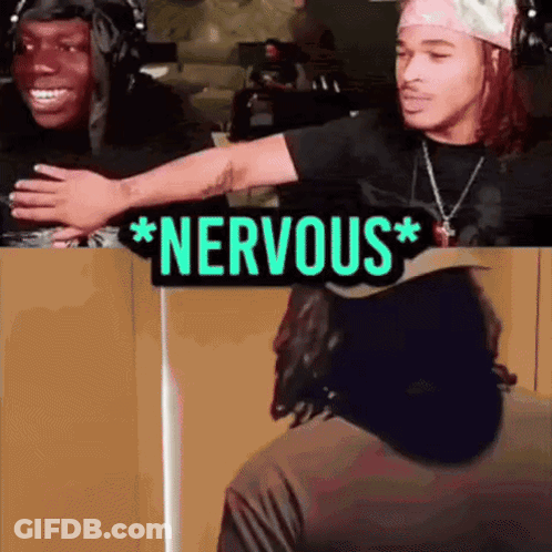 A Sign That Says Nervous On It Next To Two People GIF
