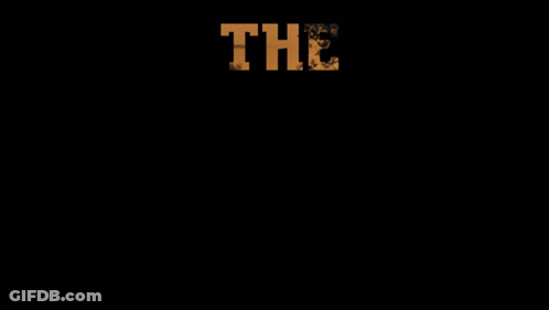 A Sign That Says The Long Walk With A Dark Background GIF