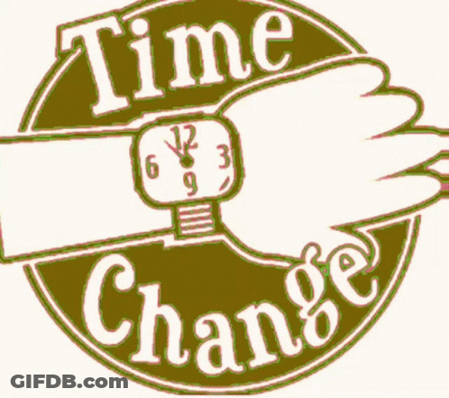 A Sign That Says Time Change With A Watch On A Hand GIF