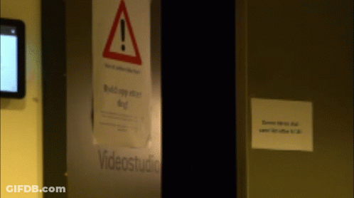 A Sign That Says Videostudio Is On A Door GIF
