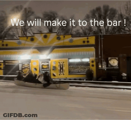 A Sign That Says We Will Make It To The Bar In Front Of A Building GIF