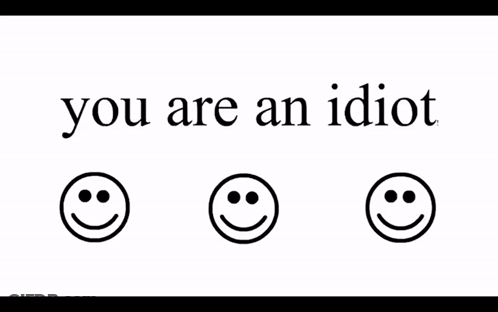 A Sign That Says You Are An Idiot With Three Smiley Faces On It GIF