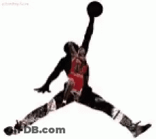 A Silhouette Of A Basketball Player Holding A Basketball In His Hand . GIF