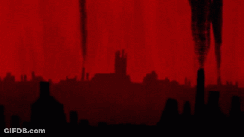 A Silhouette Of A City With A Red Background GIF
