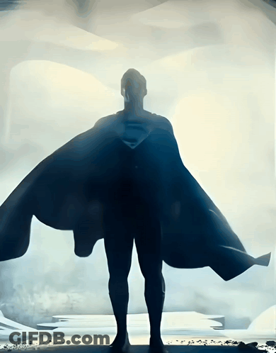 A Silhouette Of A Man In A Superman Costume GIF