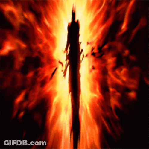 A Silhouette Of A Man Is Surrounded By Flames GIF