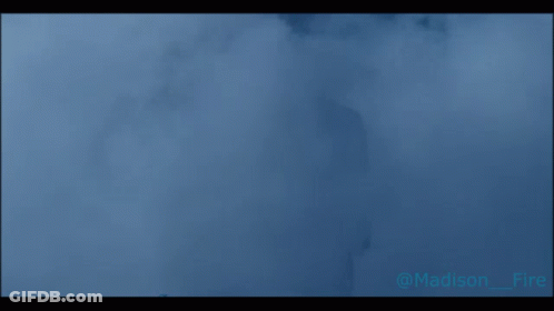 A Silhouette Of A Man Standing In A Foggy Area With A Caption That Says ' Mason Fire ' GIF