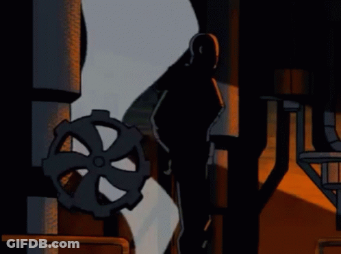 A Silhouette Of A Man Standing Next To A Metal Gear GIF