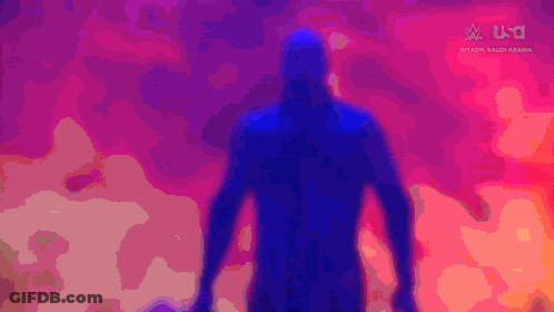 A Silhouette Of A Man Stands In Front Of A Colorful Background That Says W U.s.t. GIF