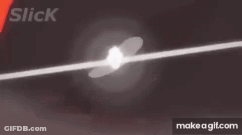 A Silhouette Of A Monster Standing In Front Of A Red Lightning Bolt . GIF