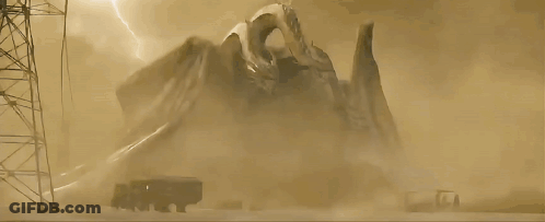 A Silhouette Of A Monster With The Letter S Visible GIF