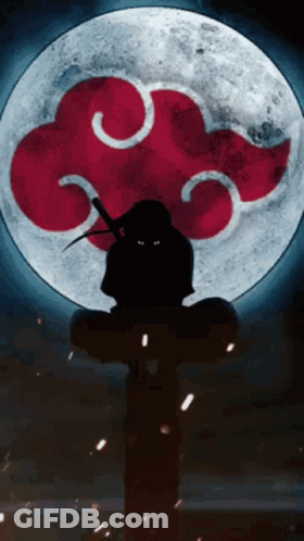 A Silhouette Of A Ninja Holding A Sword In Front Of A Full Moon GIF