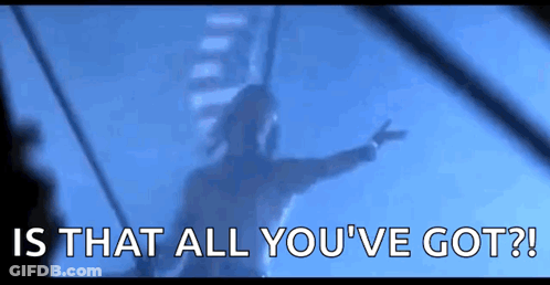 A Silhouette Of A Person Holding A Gun With The Words `` Is That All You 'Ve Got ? '' Behind Them . GIF