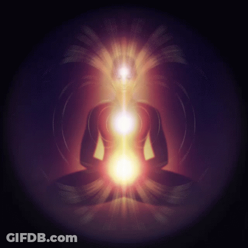 A Silhouette Of A Person In A Lotus Position With A Light Coming Out Of The Center GIF