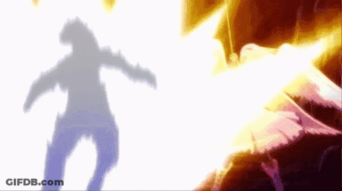 A Silhouette Of A Person Is Standing In Front Of A Fireball . GIF