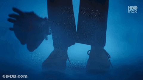 A Silhouette Of A Person Laying On The Ground With A Hbo Logo In The Corner GIF