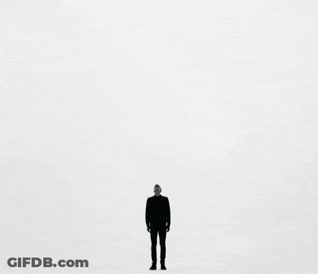 A Silhouette Of A Person Leaning Against A Wall With The Words " Feeling Stuck " Above Them GIF