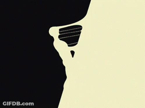 A Silhouette Of A Person 'S Face With A Black Background GIF