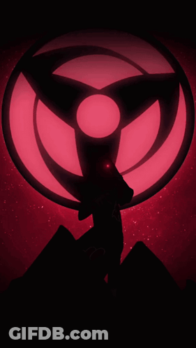 A Silhouette Of A Person Standing In Front Of A Red Eye GIF