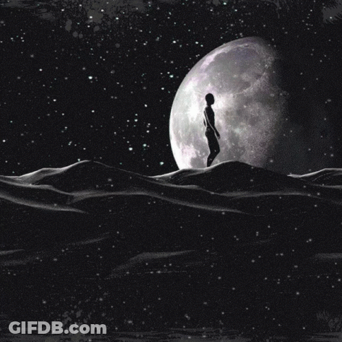 A Silhouette Of A Person Walking In Front Of The Moon GIF