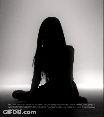 A Silhouette Of A Woman Sitting Down With A Quote On The Bottom GIF
