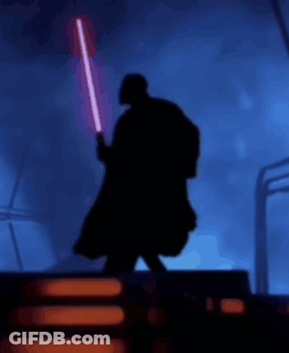 A Silhouette Of Darth Vader Is Holding A Red Lightsaber GIF