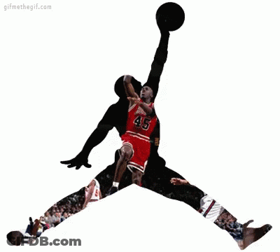 A Silhouette Of Michael Jordan Jumping In The Air GIF