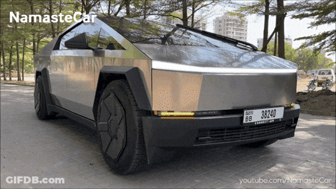 A Silver Car With A License Plate That Says 3B240 GIF