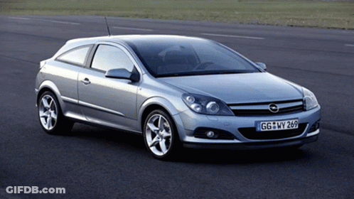 A Silver Car With Gg Wy 269 On The Front License Plate GIF