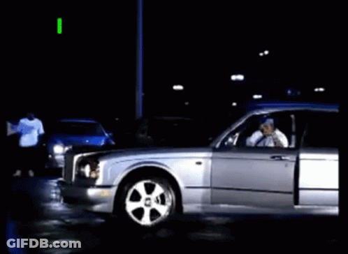 A Silver Car With The Words " I Puts In Werk " On The Top GIF