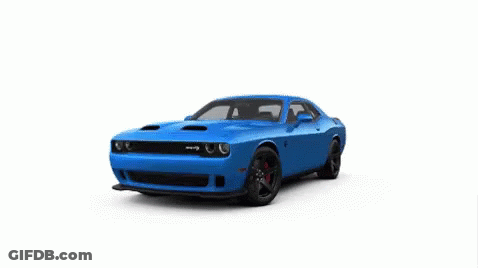 A Silver Dodge Challenger Srt Hellcat Is Sitting On A White Surface . GIF