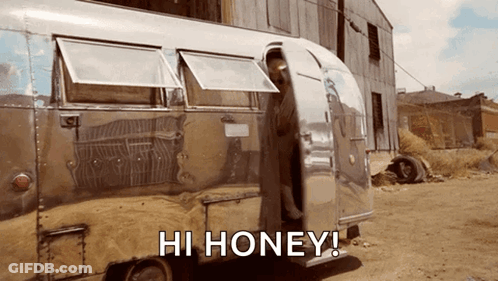 A Silver Trailer That Says Hi Honey On The Side GIF