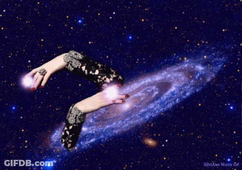 A Silviae Moon Gif Shows A Woman 'S Hands Reaching Out Towards A Spiral Galaxy GIF