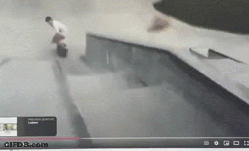 A Skateboarder Is Doing A Trick On A Ramp In A Video GIF