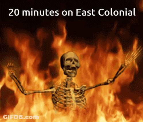 A Skeleton In Front Of A Fire With The Words 20 Minutes On East Colonial Above Him GIF