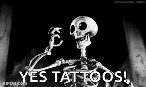A Skeleton Is Flexing His Muscles In A Black And White Photo With The Words `` Yes Tattoos '' . GIF